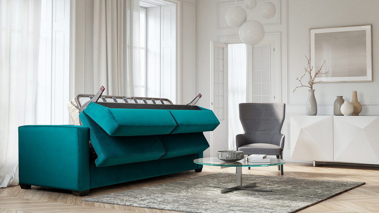 green sofa bed with coffee table and chair